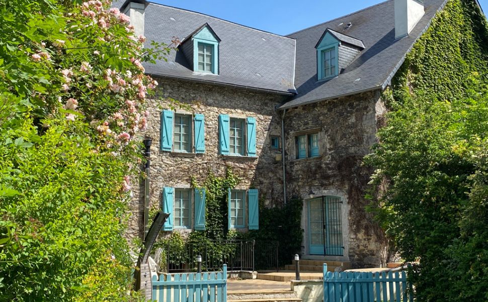 A Deceptively Large & Superbly Renovated Village Property